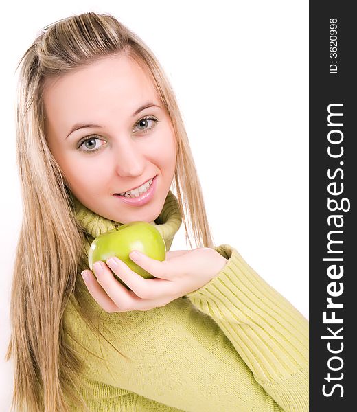 Young woman with apple in her hand