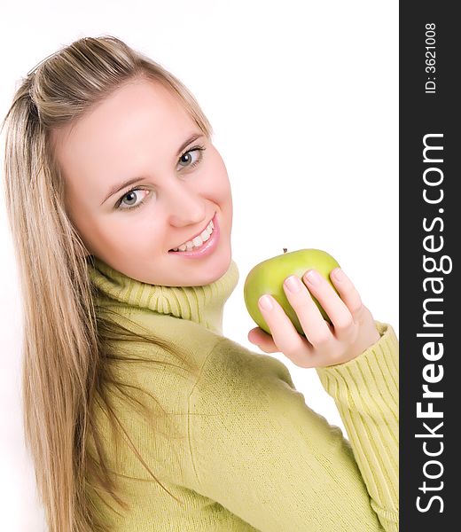 Young woman with apple in her hand