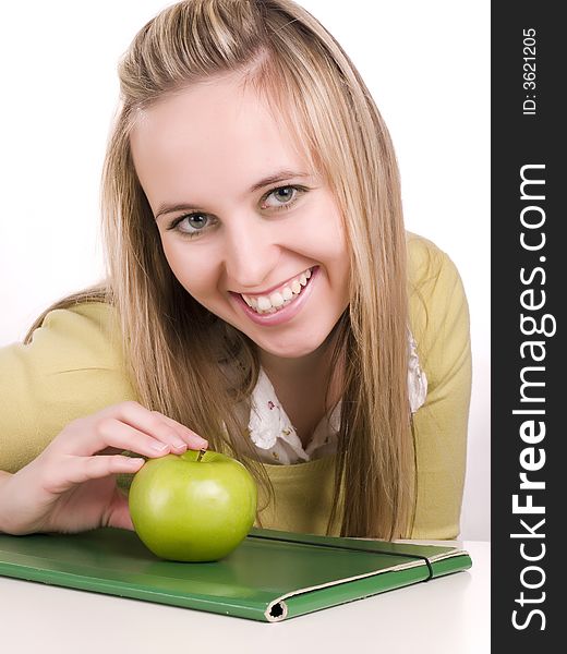 Female student with green folder and apple
