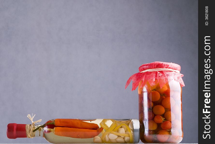 Red pepper, onion, garlic in the jar