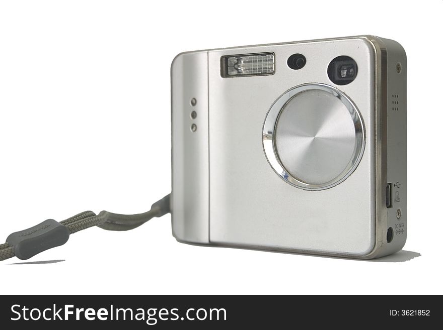 Compact digital camera at the white background