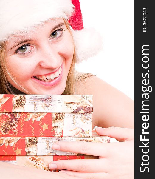 Smilling girl and christmas presents