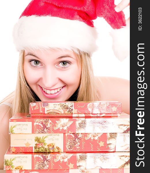 Smilling woman and christmas presents.