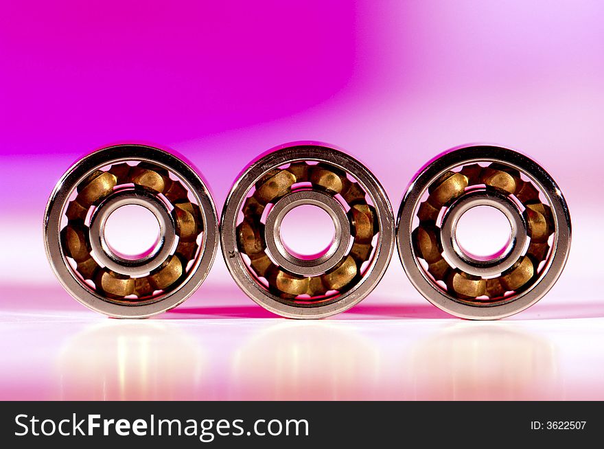 Bearings on a pink background