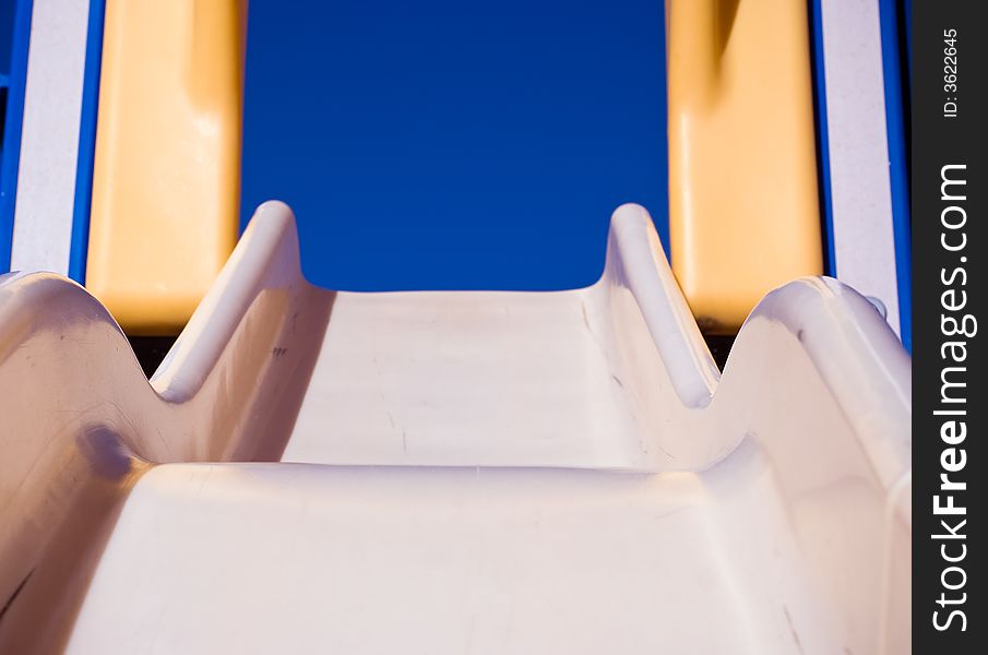 Shallow depth of field shot of a slide at a playground. Shallow depth of field shot of a slide at a playground