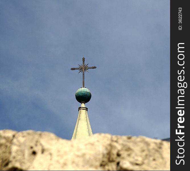 City of Arekipa in Peru - tourists attraction - cross on a blue sky. City of Arekipa in Peru - tourists attraction - cross on a blue sky