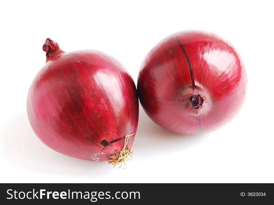 Two onions on white background