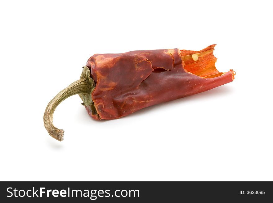 Hot dried red chili pepper, isolated white