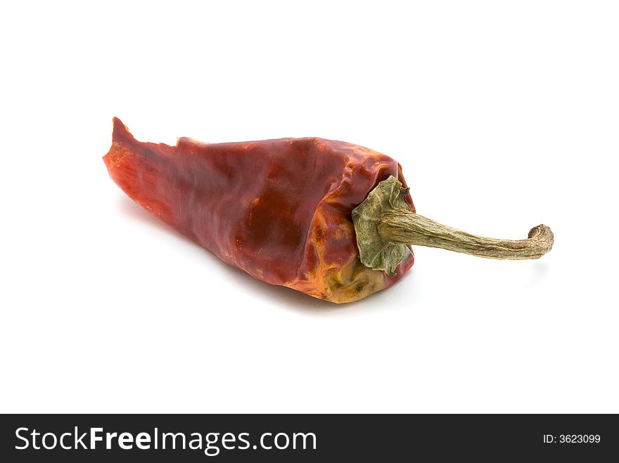 Hot dried red chili pepper, isolated white