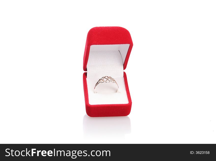 Wedding ring in a opened luxurious red box. Wedding ring in a opened luxurious red box