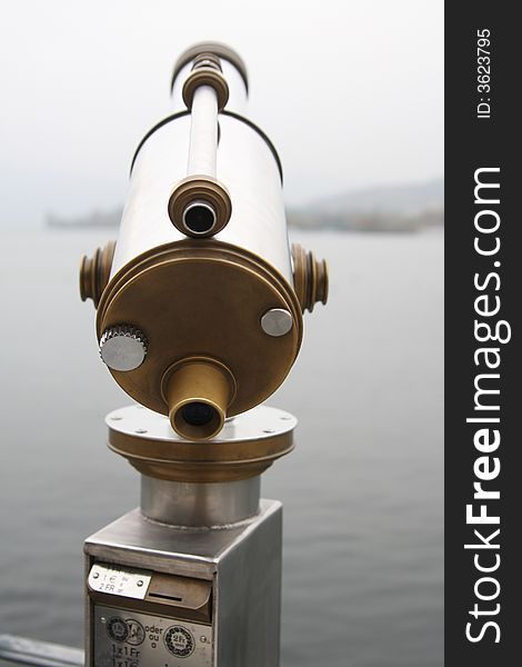 A viewing telescope at lake luzern. A viewing telescope at lake luzern