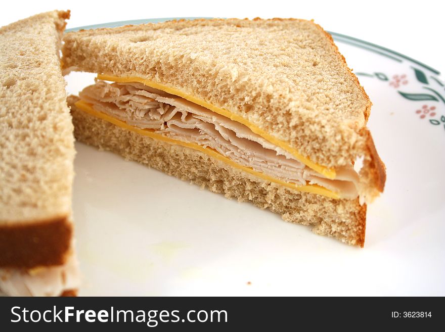 Isolated  Turkey Sandwich on Whole Grain Bread