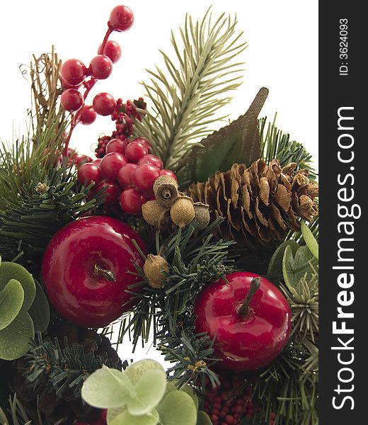Fragment of christmas wreath on white background