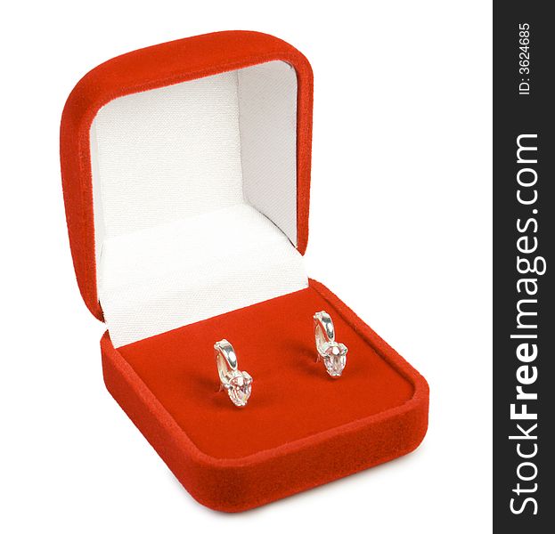 Silver earring in red box.