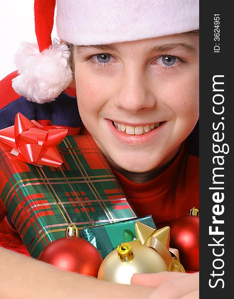 Shot of a young boy with presents - Merry Christmas. Shot of a young boy with presents - Merry Christmas
