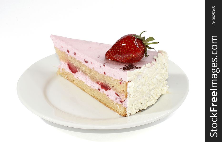 Tasty cake with cream and with fresh strawberries
