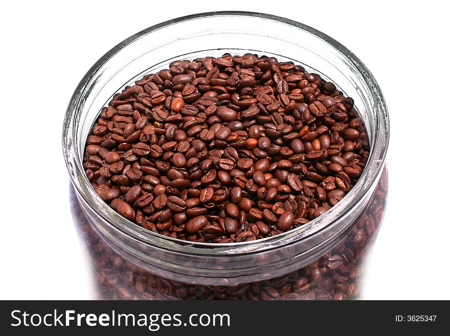 A big jar full of coffee beans, isolated on white