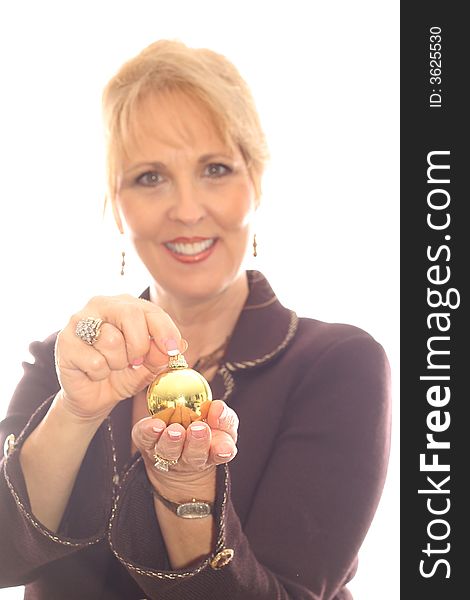 Shot of a woman with ornament in hand vertical