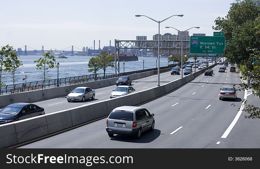 View on the traffic on FDR Drive, downtown Manhattan and East River