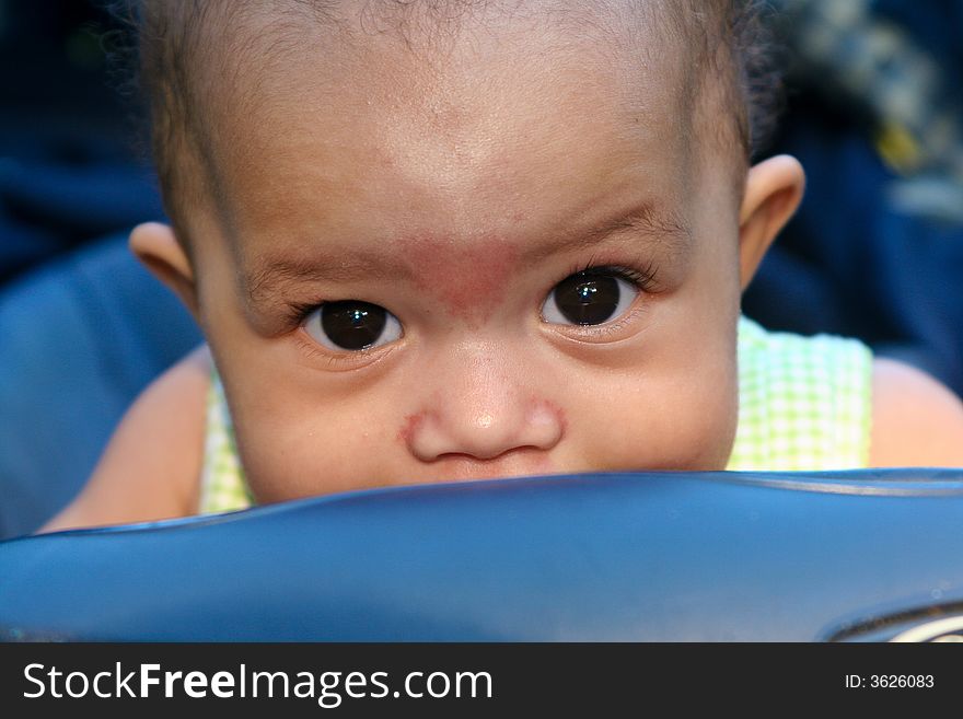 Portrait of cute baby girl exploring the world with her mouth. Portrait of cute baby girl exploring the world with her mouth