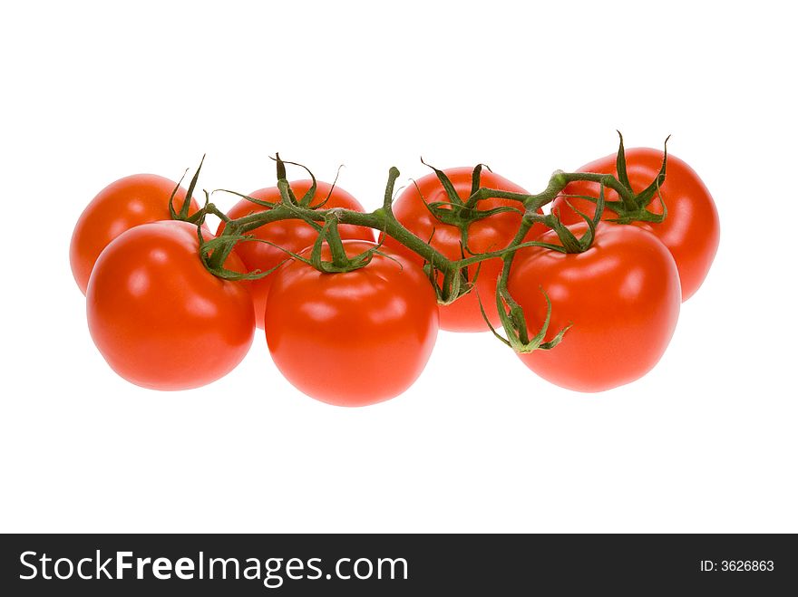 Fresh bunch of tomatos isolated on a white background