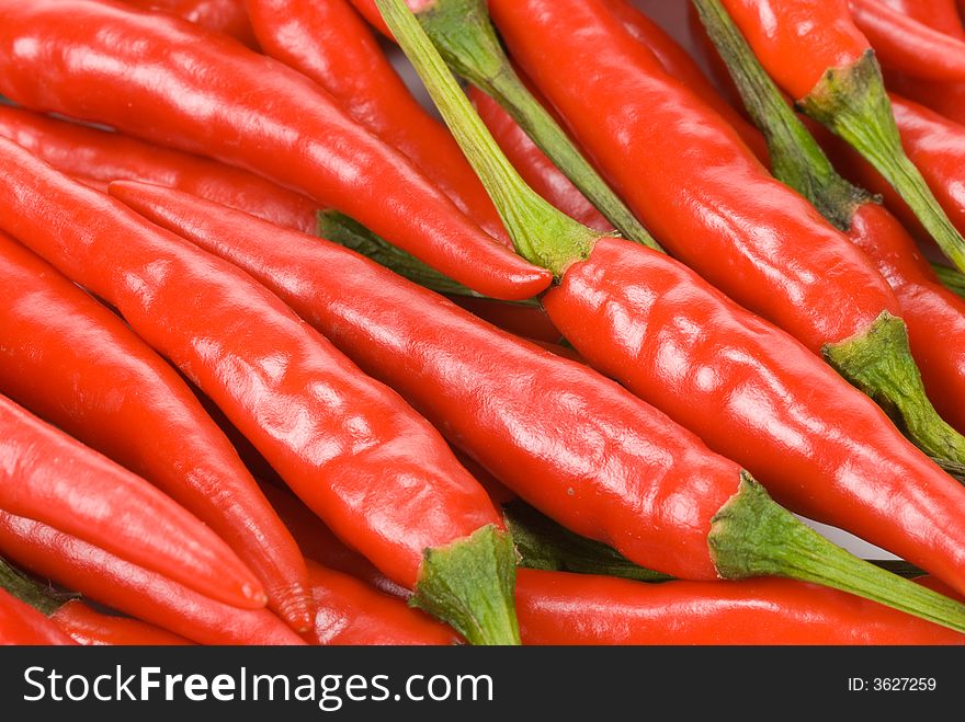 Close-up of fresh red chili peppers for backgrounds