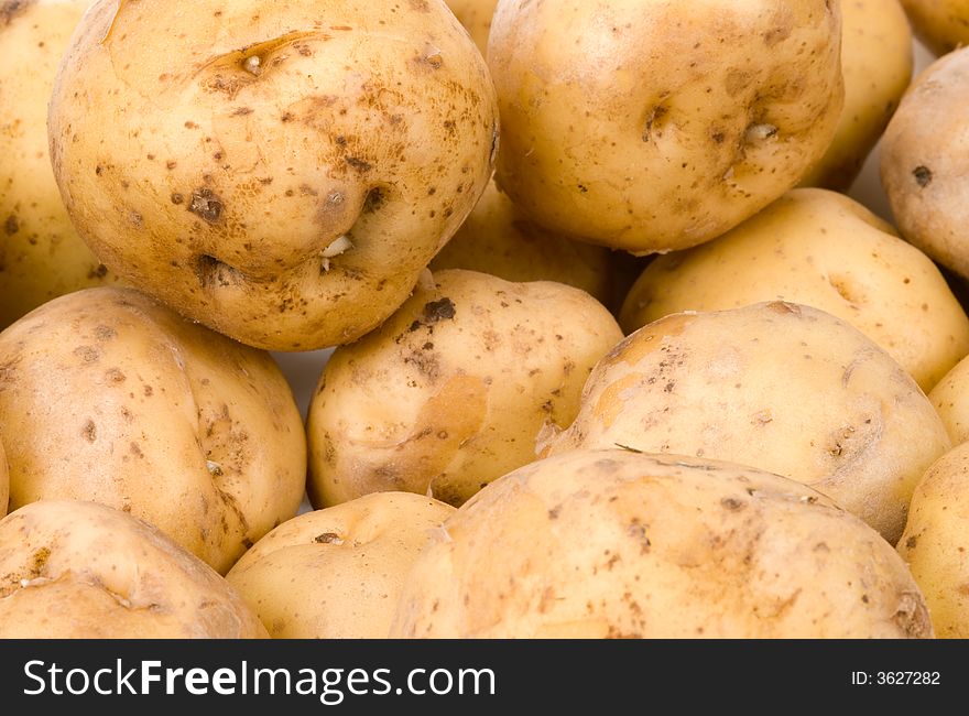 Close-up of fresh potatoes for backgrounds. Close-up of fresh potatoes for backgrounds