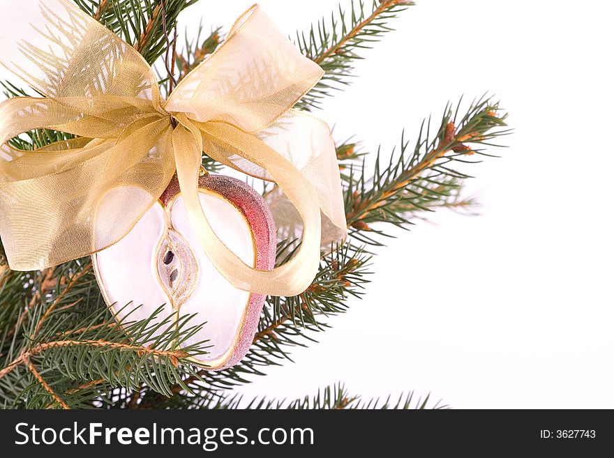 Christmas apple and gold ribbon isolated on white. Christmas apple and gold ribbon isolated on white