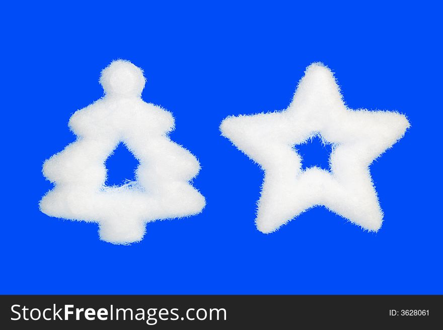 Snow christmas tree and star, isolated on blue