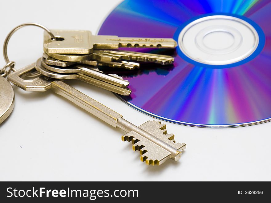 Bundle of keys lying on a CD. Bundle of keys lying on a CD