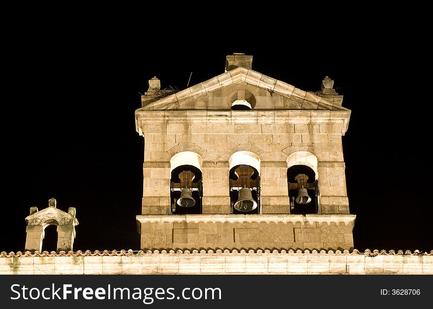 Iluminated belfry in Salamanca, Spain .