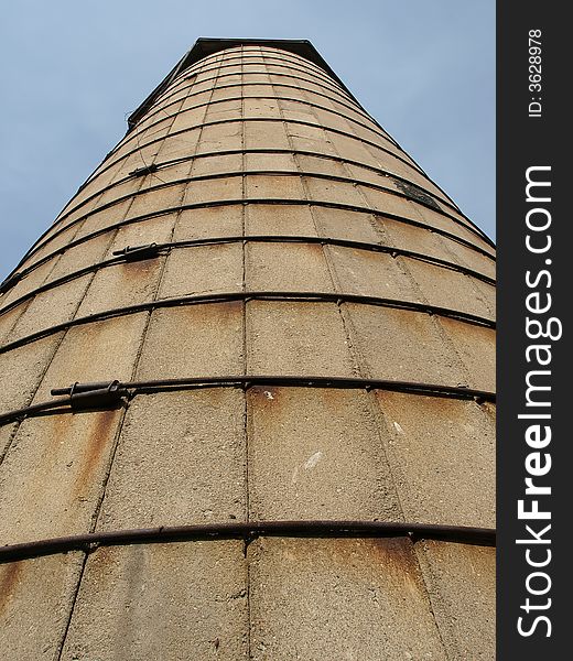 Old cement silo held together with steel rods