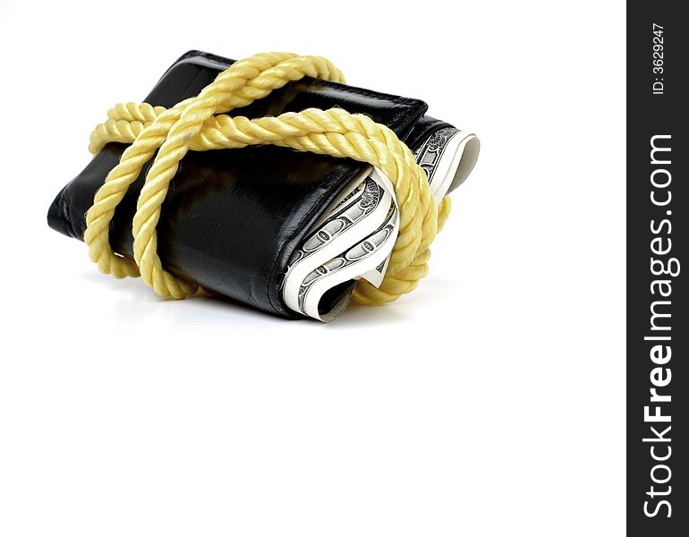 Closeup of hundred dollar bills in bulging wallet tied with rope. Closeup of hundred dollar bills in bulging wallet tied with rope