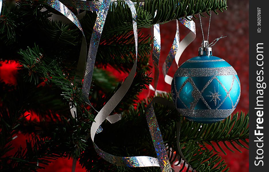 Blue ball on christmas tree close up