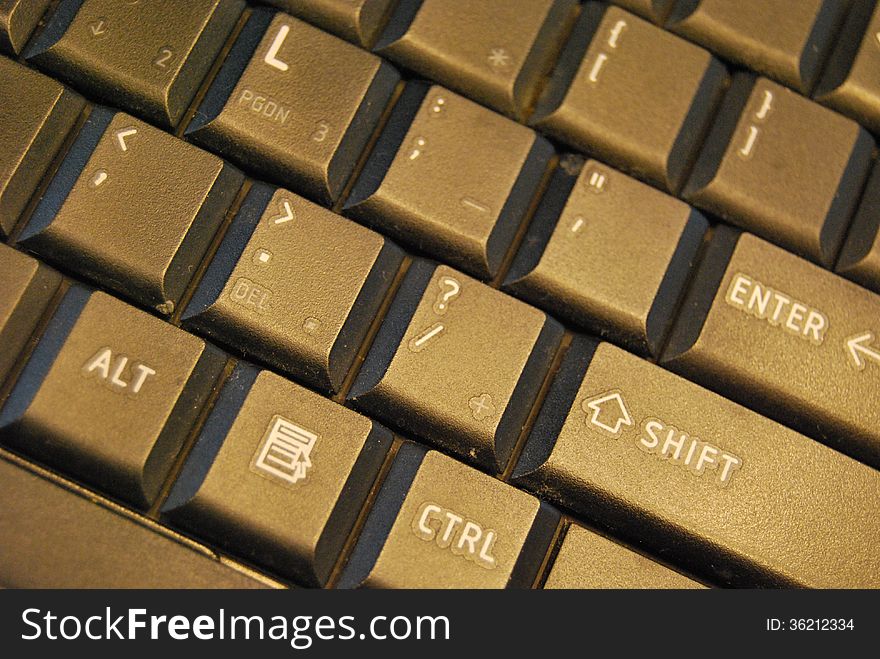 Part of black keyboard and letters