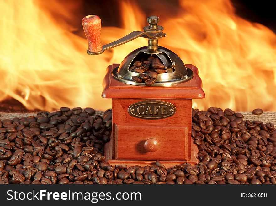 Old Coffee Grinder and Roasted Coffee Beans