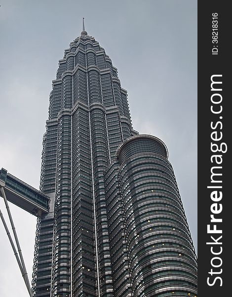The Petronas Towers, also known as the Petronas Twin Towers (Malay: Menara Petronas, or Menara Berkembar Petronas) are twin skyscrapers in Kuala Lumpur, Malaysia. According to the Council on Tall Buildings and Urban Habitat (CTBUH)'s official definition and ranking, they were the tallest buildings in the world from 1998 to 2004 until surpassed by Taipei 101, but they remain the tallest twin buildings in the world. The buildings are the landmark of Kuala Lumpur with nearby Kuala Lumpur Tower.