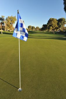 Checkered Golf Flag On A Green Stock Photo Checkered Golf Flag On A Green Stock Photo