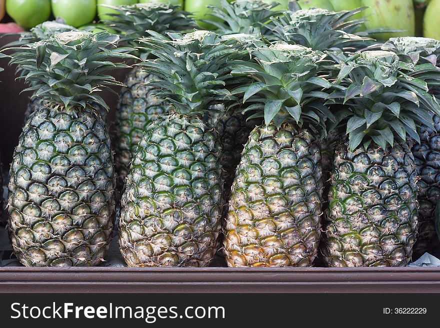 Pineapple sell in outdoor market.