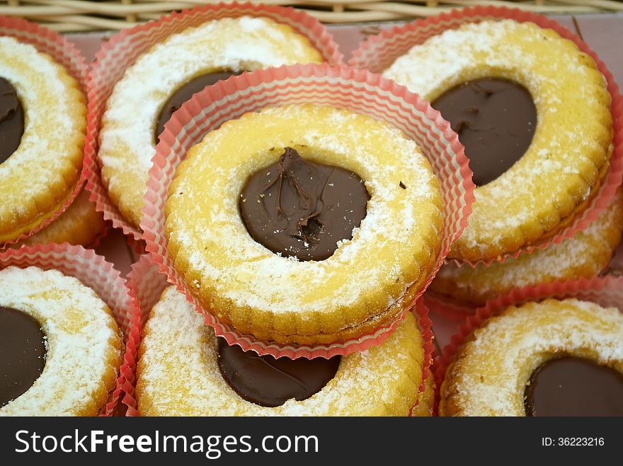 Chocolate filled cookies presented on a serving tray