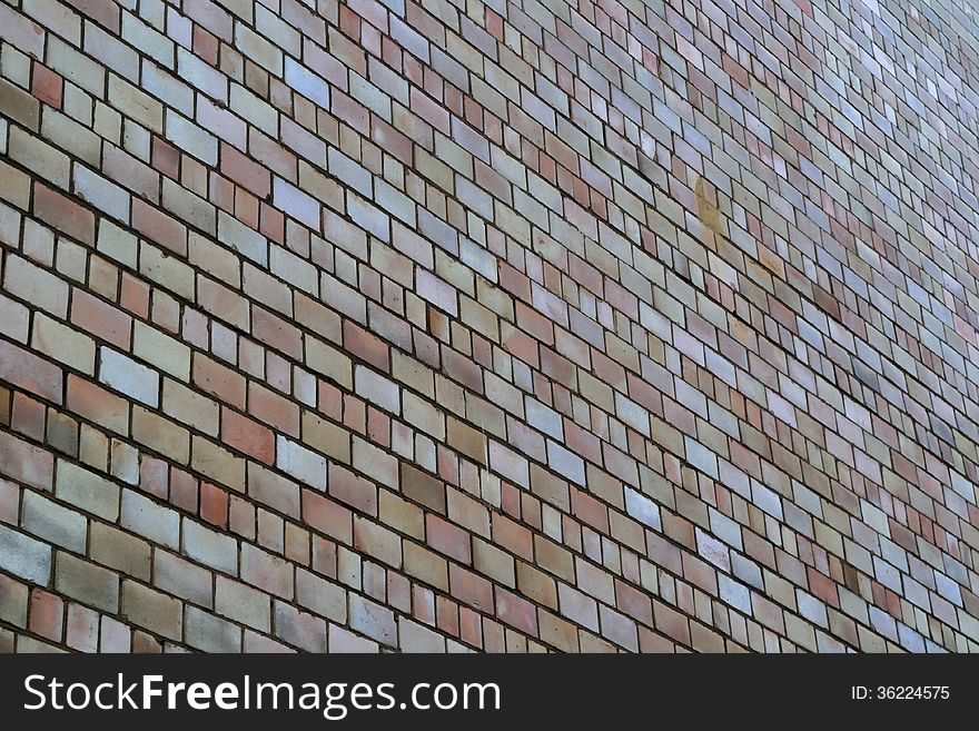High brick wall background;