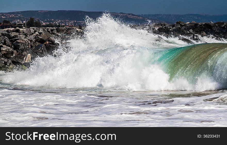 Big wave rolling towards the shore in Balboa Peninsula, CA. Big wave rolling towards the shore in Balboa Peninsula, CA.