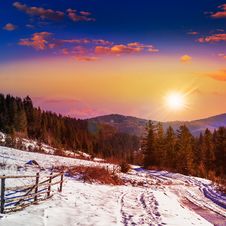 Fence By The Road To Snowy Forest In The Mountains Royalty Free Stock Image Fence By The Road To Snowy Forest In The Mountains Royalty Free Stock Image