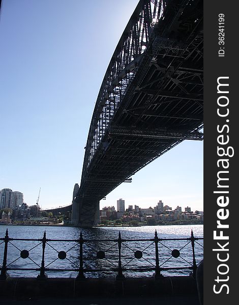 Standing below sdyney harbour bridge on a beautiful summer day by the waters edge. Standing below sdyney harbour bridge on a beautiful summer day by the waters edge