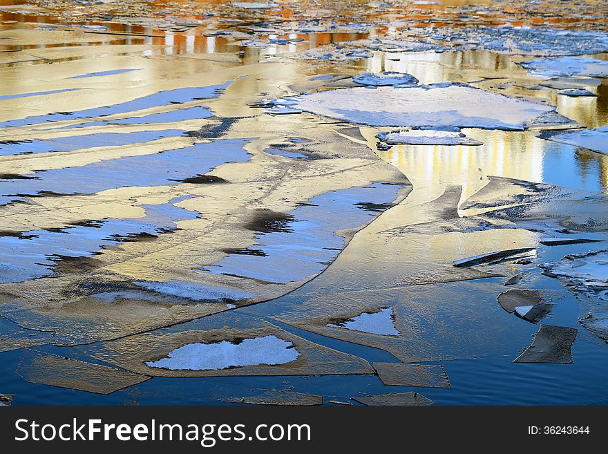 Sunlit drifting ice floe on the river in winter. Sunlit drifting ice floe on the river in winter