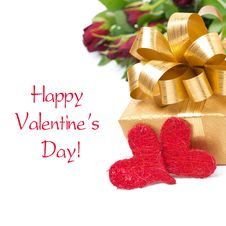 Golden Gift Box, Two Red Hearts And Flowers, Isolated Stock Photo Golden Gift Box, Two Red Hearts And Flowers, Isolated Stock Photo