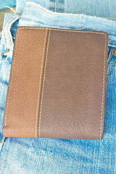 Brown Wallet In Jeans Trousers Back Pocket Royalty Free Stock Photos