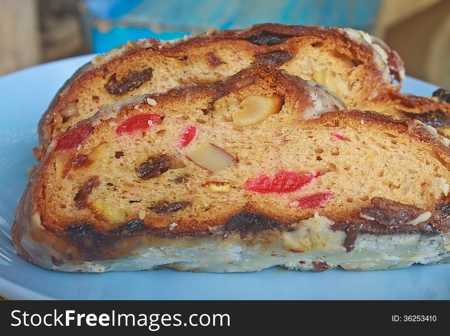 Fruitcake with raisin and Seasoning on table