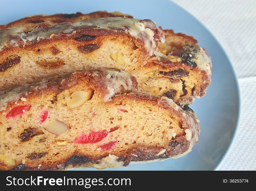 Fruitcake with raisin and Seasoning on table