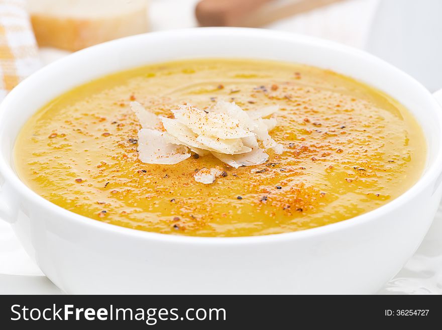 Cream soup of yellow lentils, close-up, horizontal
